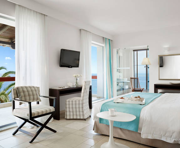 Eagles Palace Resort Chalkidiki junior Suite bedroom with big mirror and sea view balcony