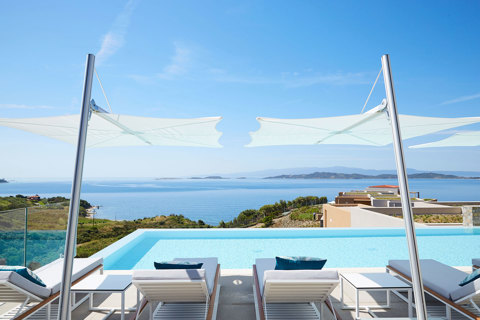 Eagles Resort Chalkidiki white sunbeds by the Pool, with sea views