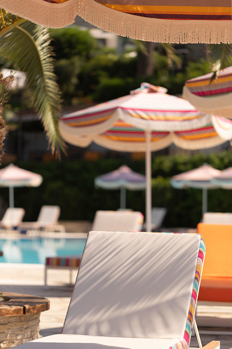 Eagles Resort Chalkidiki Pool Bar with aunbeds under the shade of umbrellas