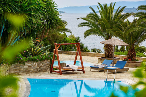 Eagles Resort Chalkidiki Outdoor Pool with garden swing and sunbeds