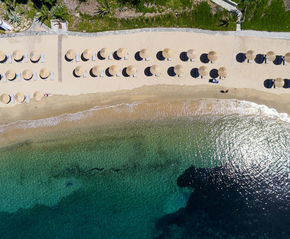 Eagles Resort Chalkidiki sandy beach with umbrellas