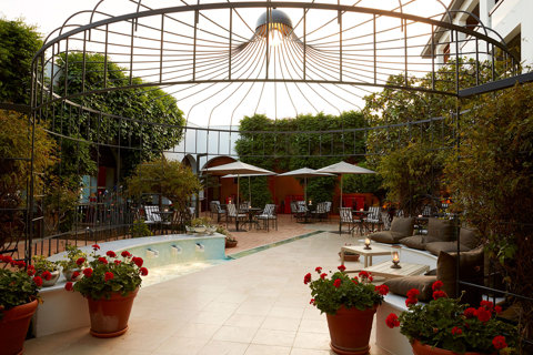 Eagles Resort Chalkidiki Patio with red flower pots