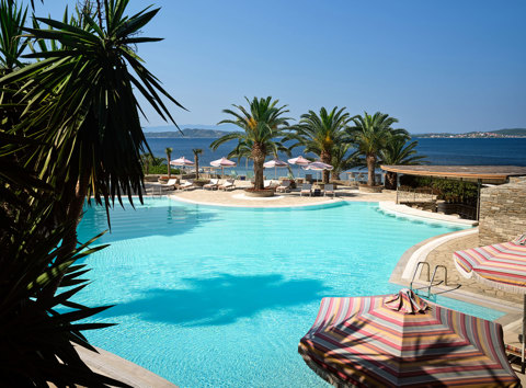 Eagles Resort Chalkidiki Swimming Pool by the sea with palm trees