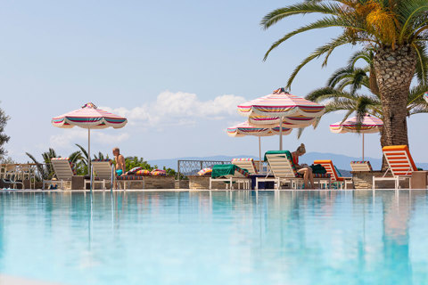 Eagles Resort Chalkidiki Swimming Pool with sunbeds and umbrellas