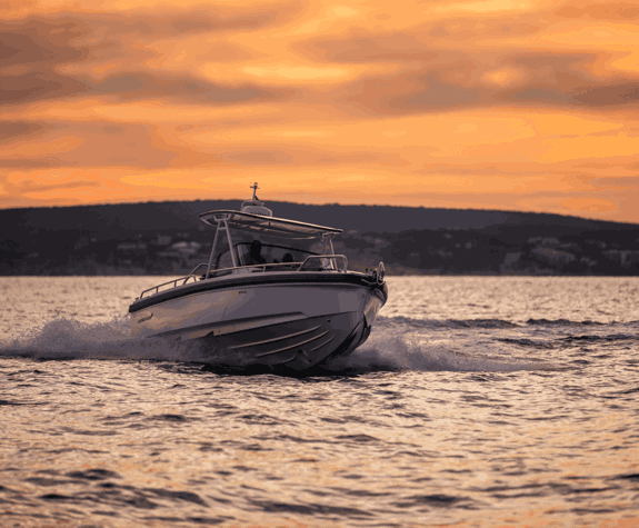 Luxury motorboat at sea during a romantic sunset cruise