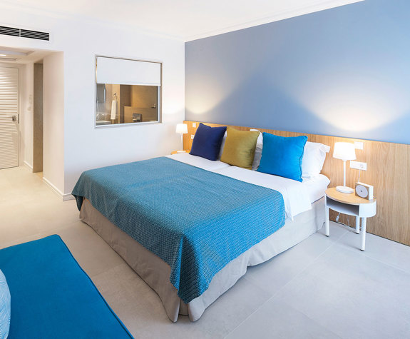 Eagles Palace Resort Chalkidiki Suite bedroom with double bed and big mirror