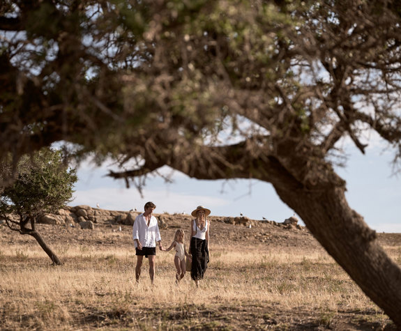 Family walking in Drenia island's nature
