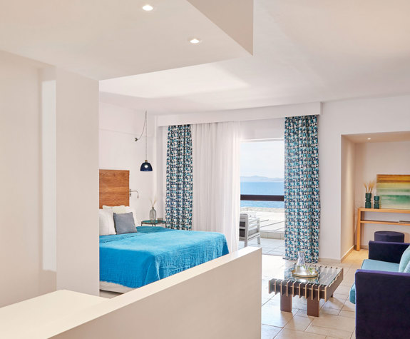 Eagles Palace Resort Chalkidiki junior Suite bedroom with living room