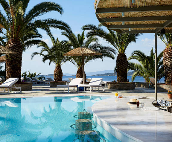 Eagles Resort Chalkidiki Pool Bar with palm trees and sea view