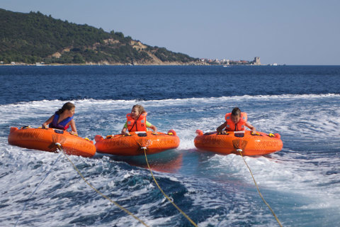 Eagles Resort Chalkidiki Water Sports kids doing ringo at sea