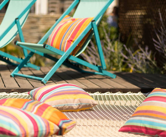Eagles Resort Chalkidiki Pool Bar with bluie sunbeds and colorfull pillows