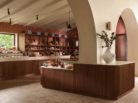Breakfast buffet with fresh break, pastries and fruits in elegant interior of Melathron restaurant at Eagles Resort