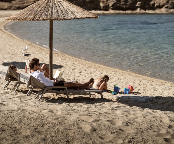Eagles Resort Chalkidiki sandy beach with sunbeds and umbrellas